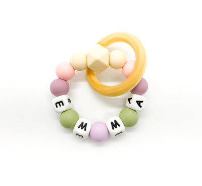 pink green purple personalized baby teether ring