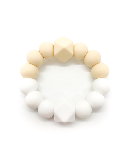 beige white baby teether toy